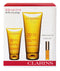 Clarins Beach Beauty Kit: Sun Wrinkle Control Cream for Face 30 UVB/UVA 75ml+Sun Care Cream 20 UVB/UVA 200ml+Lip Comfort Oil 2.8ml 3pcs